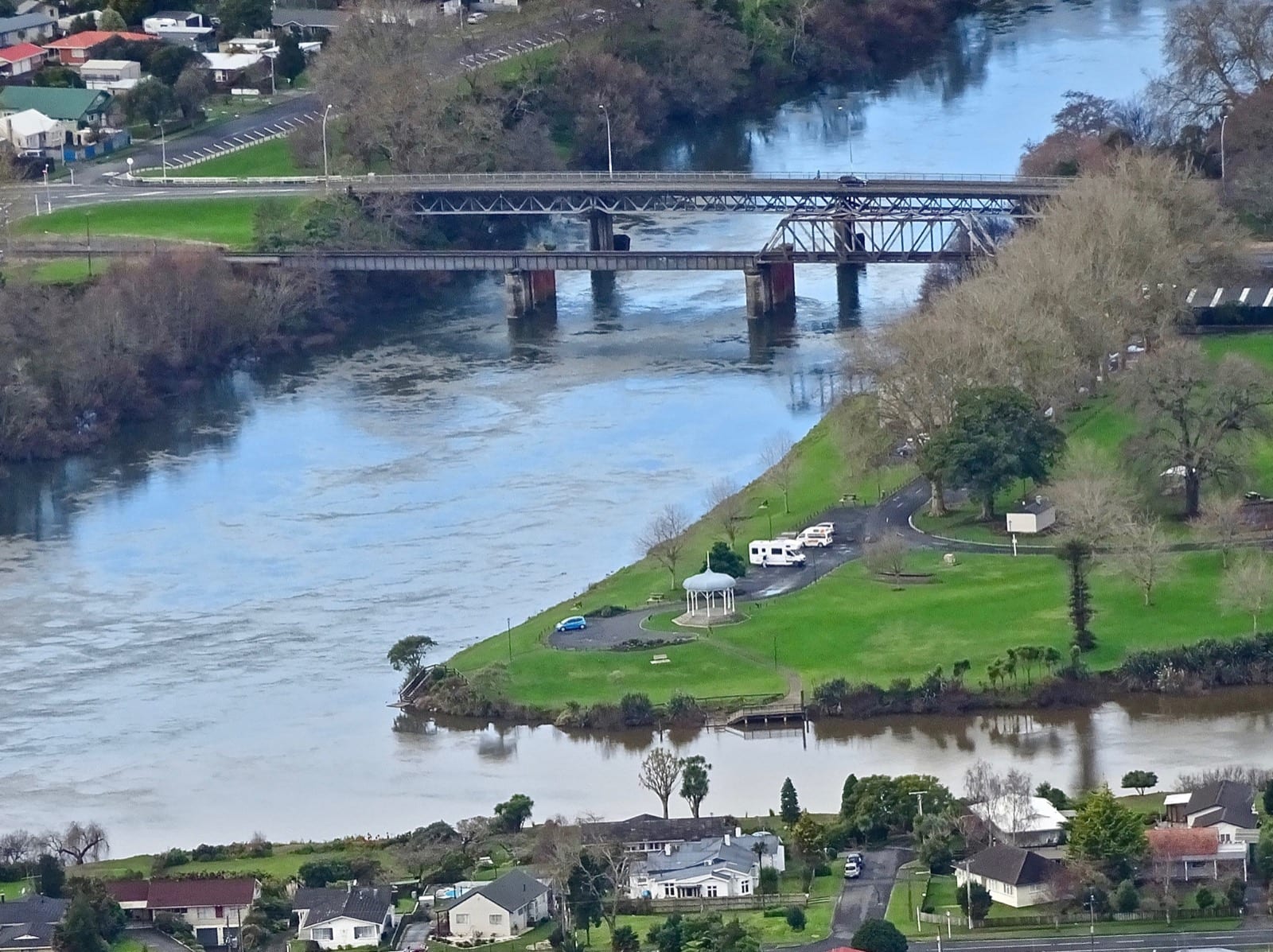 The road and rail bridges and The Point reserve at the Waikato-Waipa river confluence, Ngaruawahia.