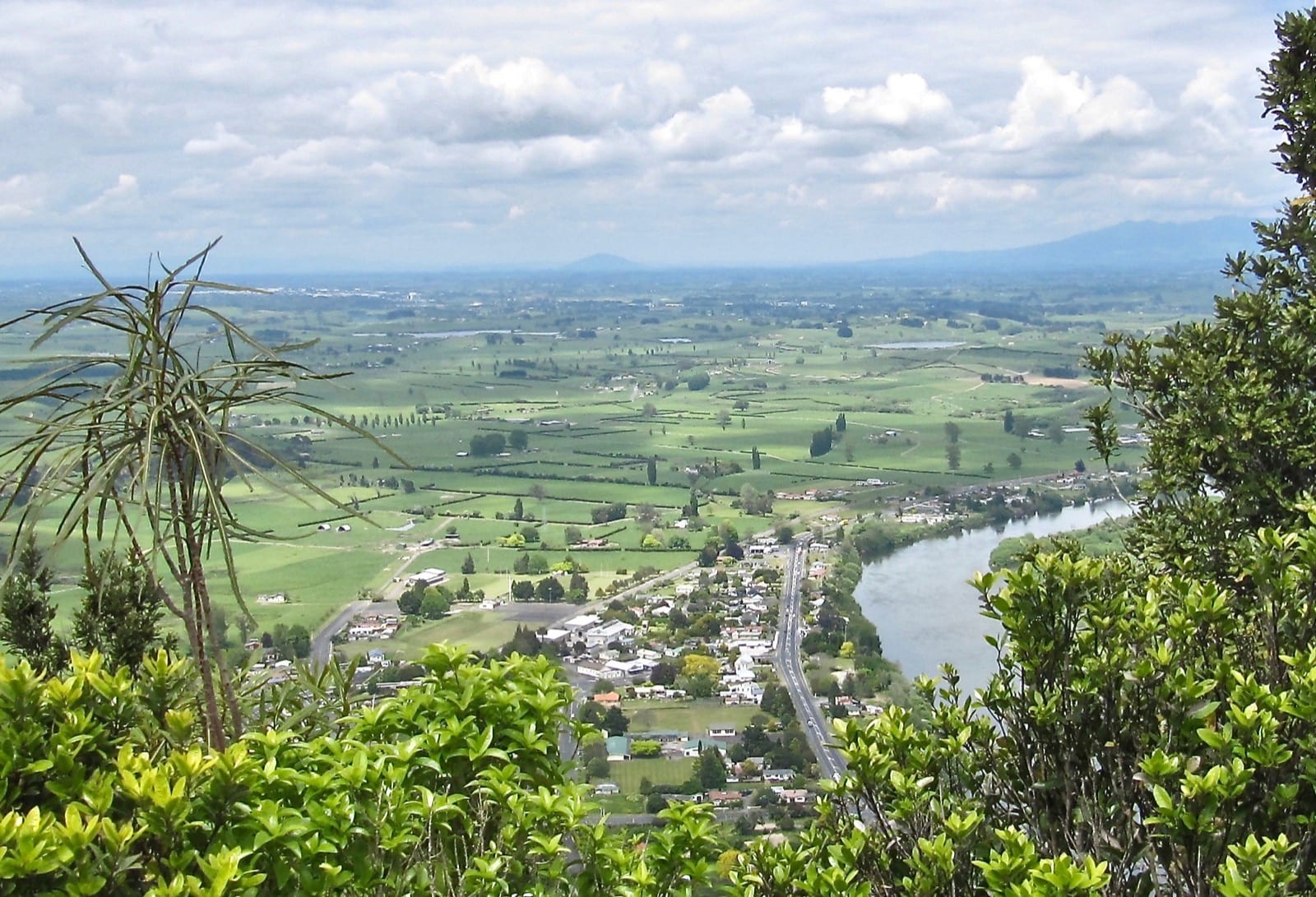 Taupiri township, the Waikato River and north Waikato farmland seen from Taupiri Mountain.